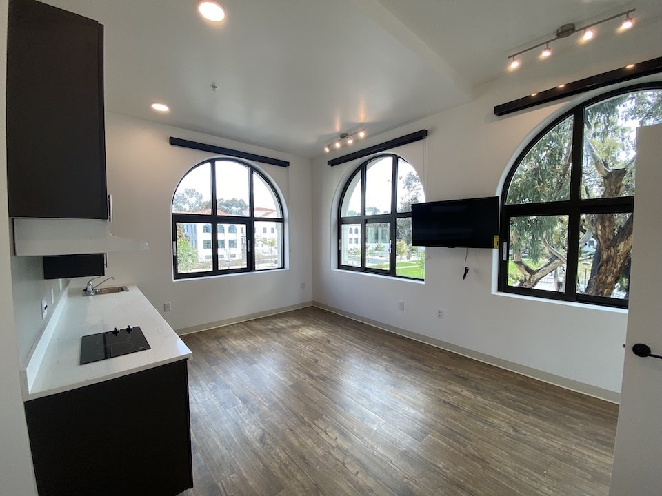 Typical infilled porch/ living space. Drop ceiling and radiators have been removed